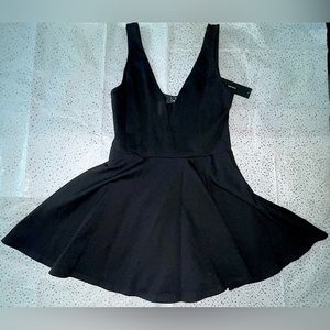 BRAND NEW!! BEAUTIFUL BLACK DRESS WITH SHORTS.